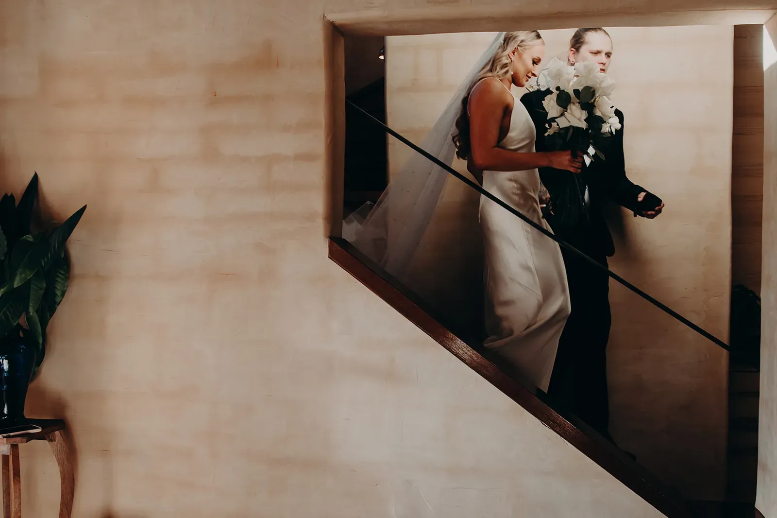 monique_josh_walking_downstairs_venue_ca75167f6f