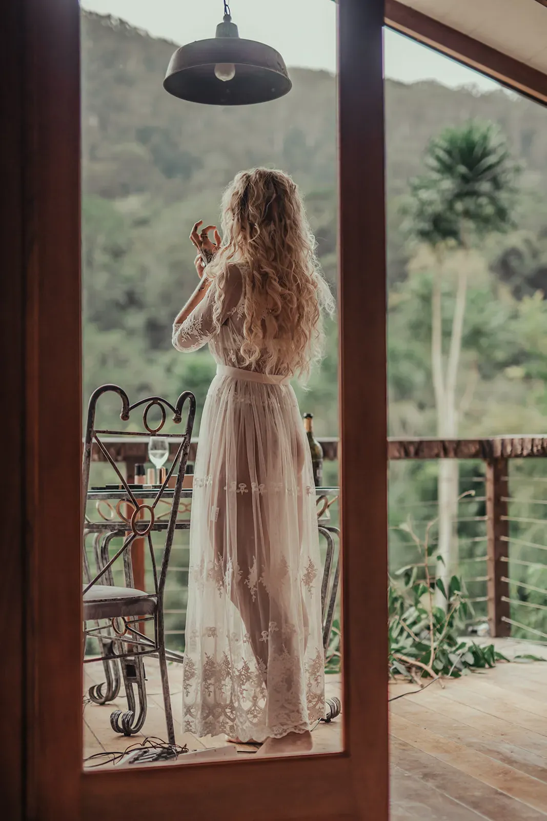 sally_mitch_real_wedding_bride_lace_boho_dress_rainforest_balcony_wedlii_a0006af9d2