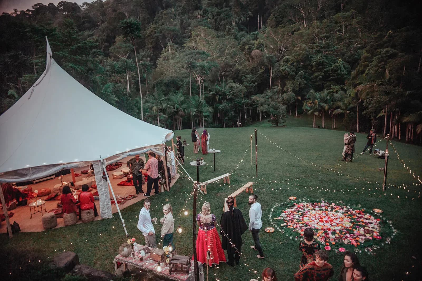 sally_mitch_real_wedding_venue_exterior_marquee_dusk_rainforest_wedlii_eccaa9b7cb