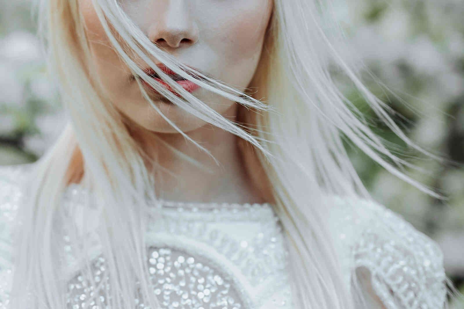 bride_portrait_close_up_wind_blown_hair_fbeb2e1b84