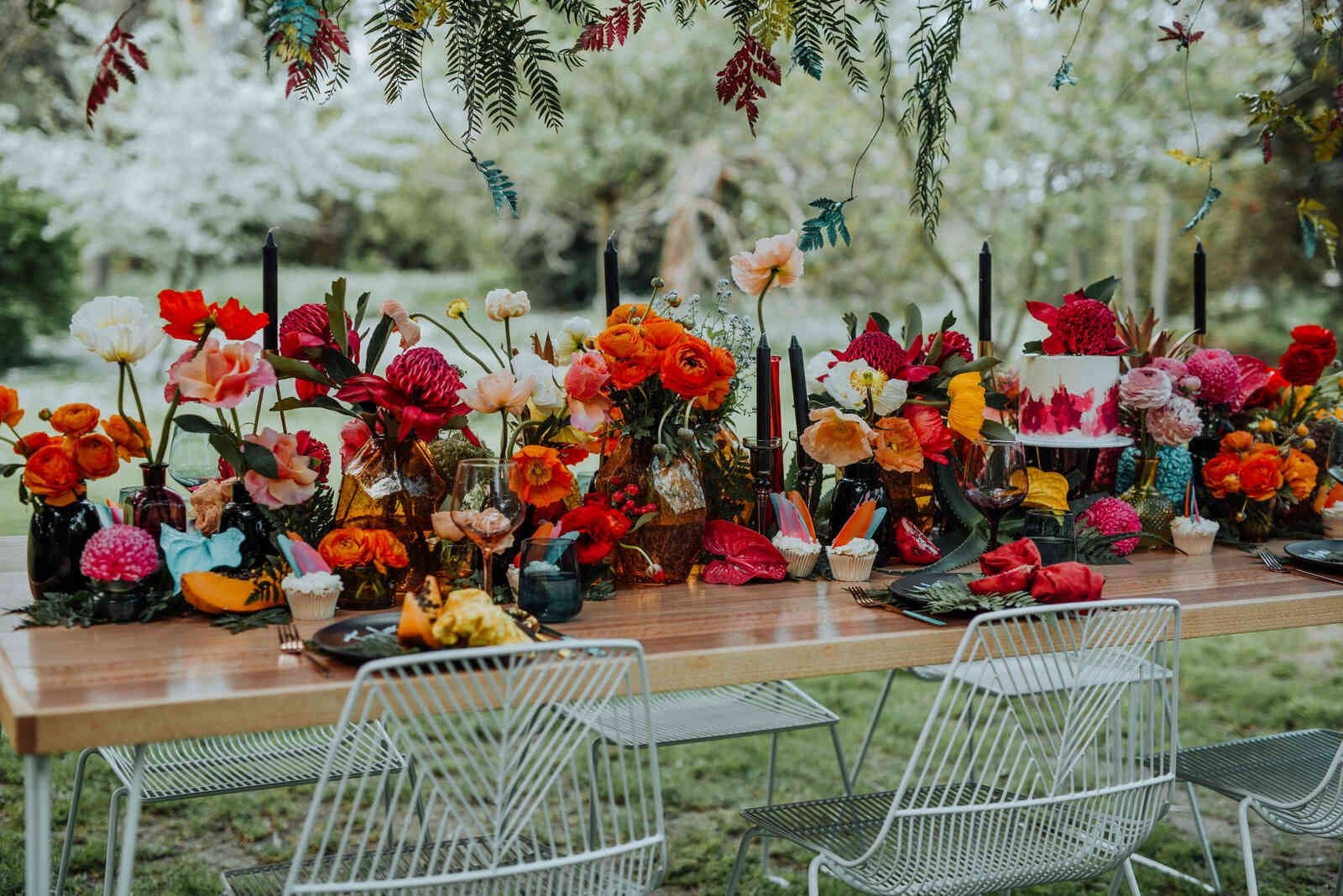 outdoor_wedding_reception_table_colorful_centerpiece_89d20562b9