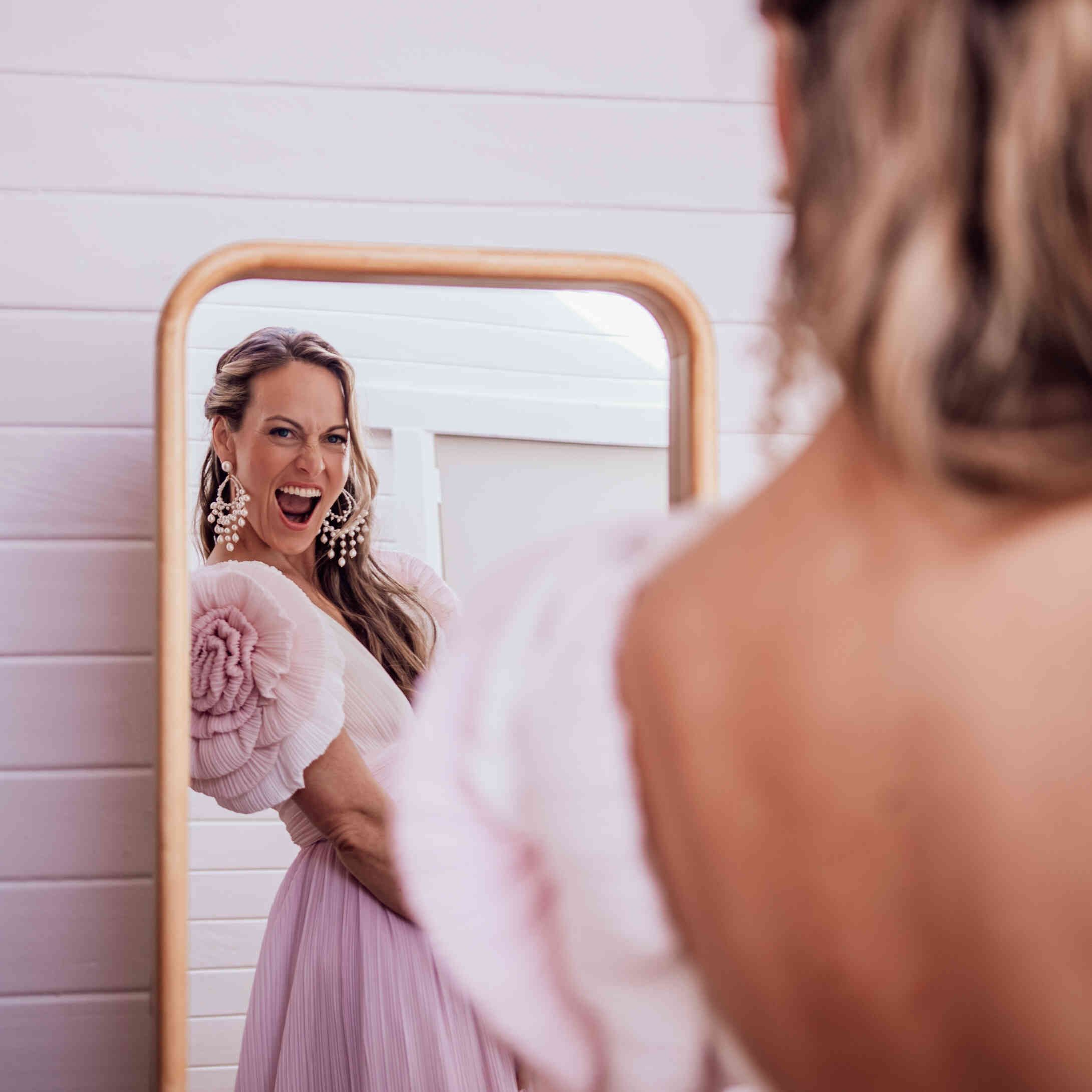 bride_mirror_reflection_getting_ready_exaggerated_sleeves_1653fd870c