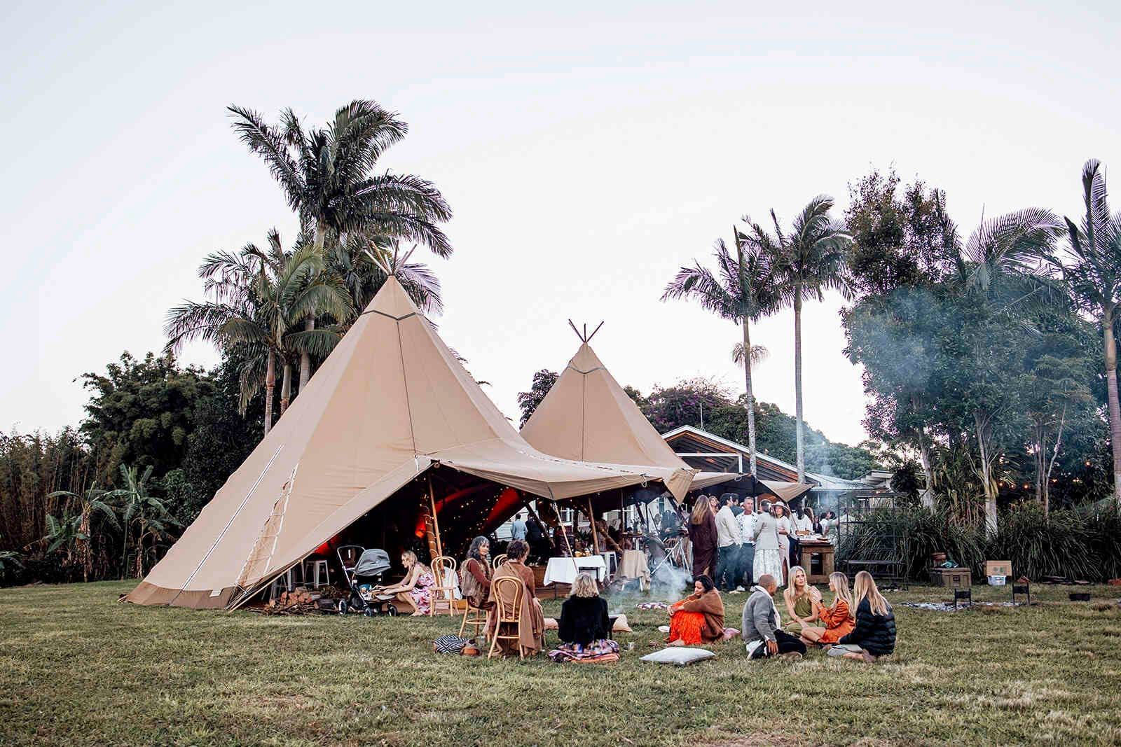 tipi_tents_wedding_reception_outdoor_lounge_area_sunset_ea7c1f6422
