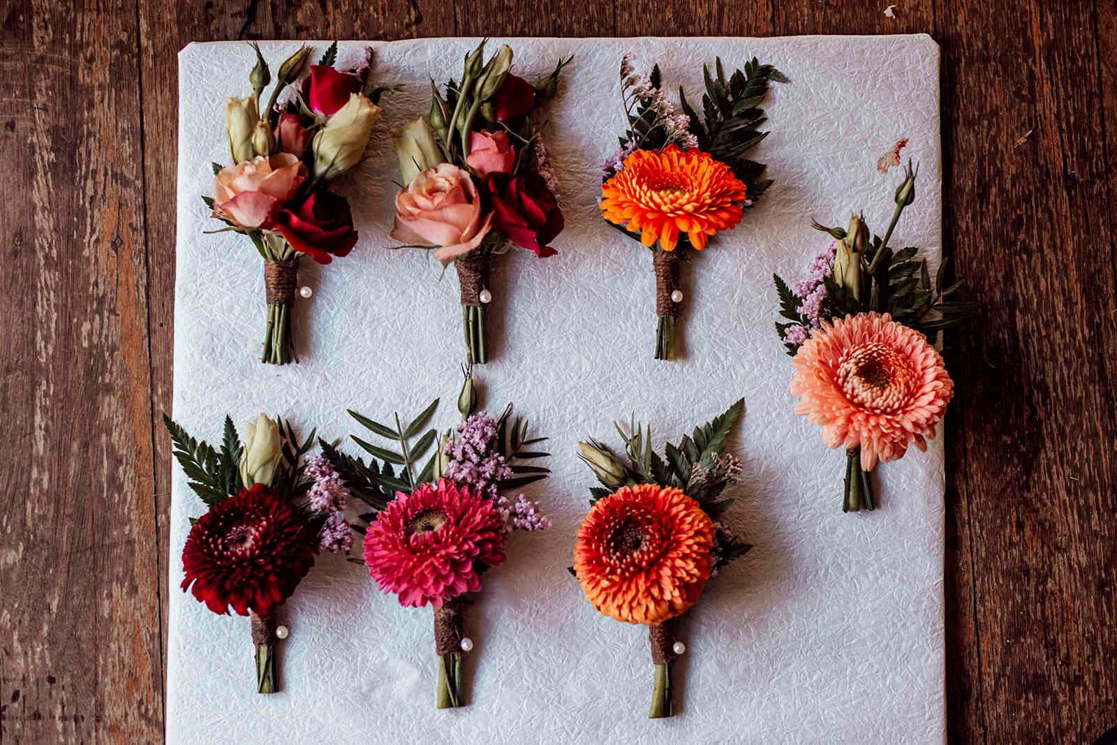 colorful_groomsmen_boutonnieres_gerbera_roses_11c972ad38