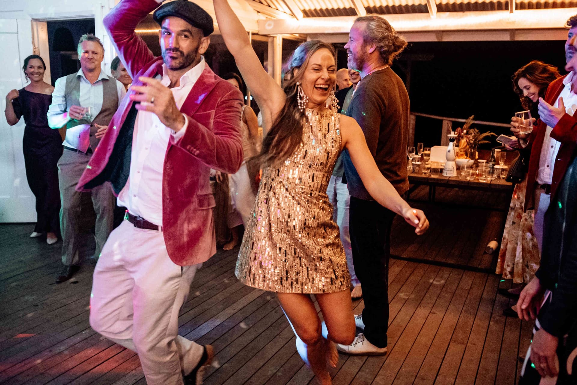 bride_groom_dancing_sequin_dress_pink_velvet_jacket_reception_77e139aec1