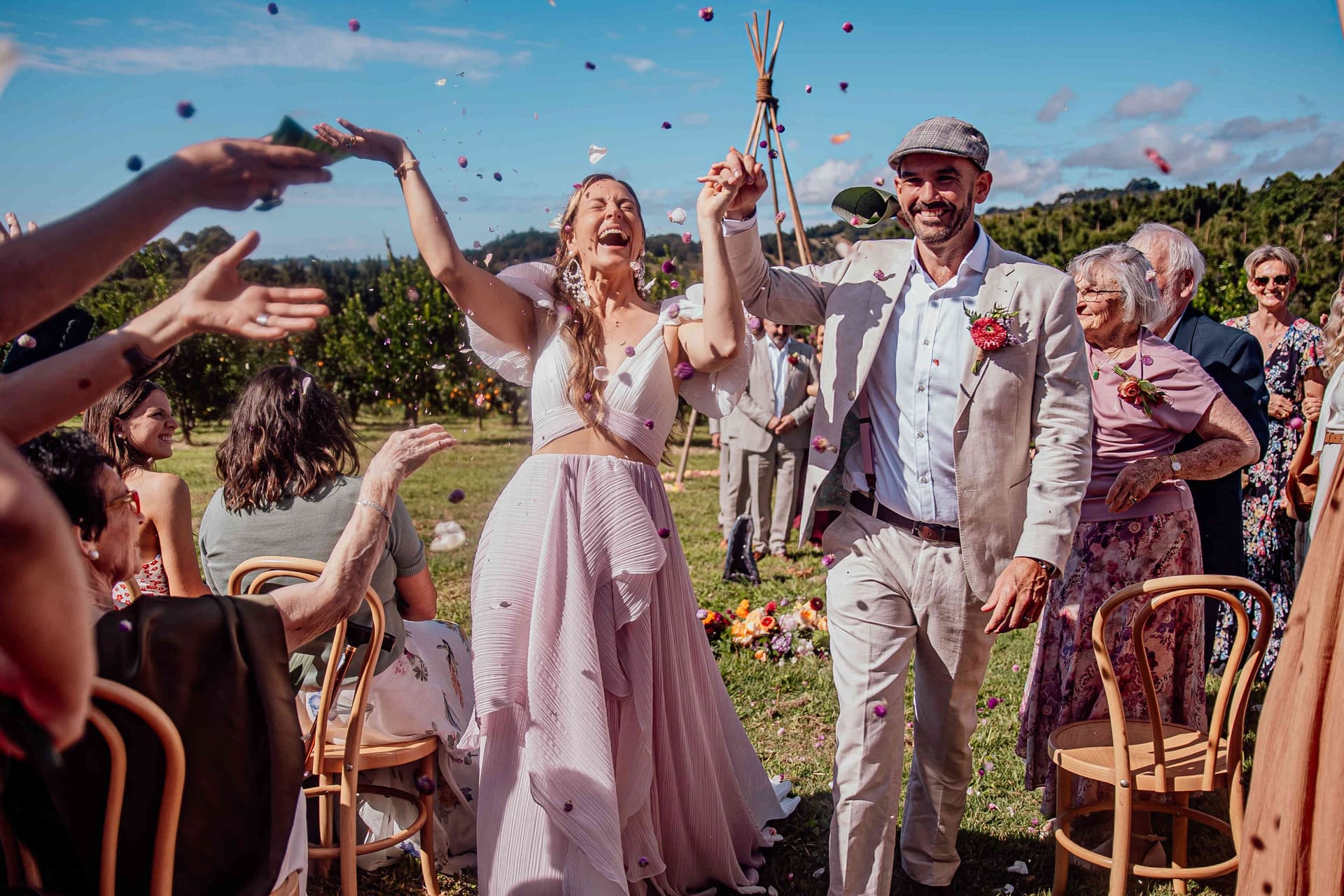 confetti_toss_bride_groom_recessional_outdoor_wedding_7aba0c1d39