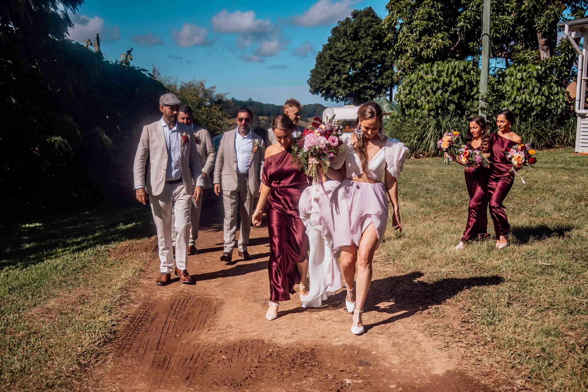 wedding_party_walking_recessional_pink_burgundy_attire_86481be215